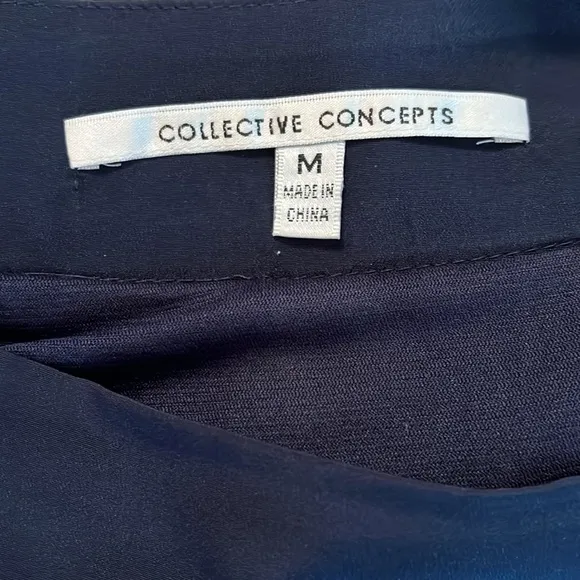 Collective Concepts navy &amp; white pleated skirt size M