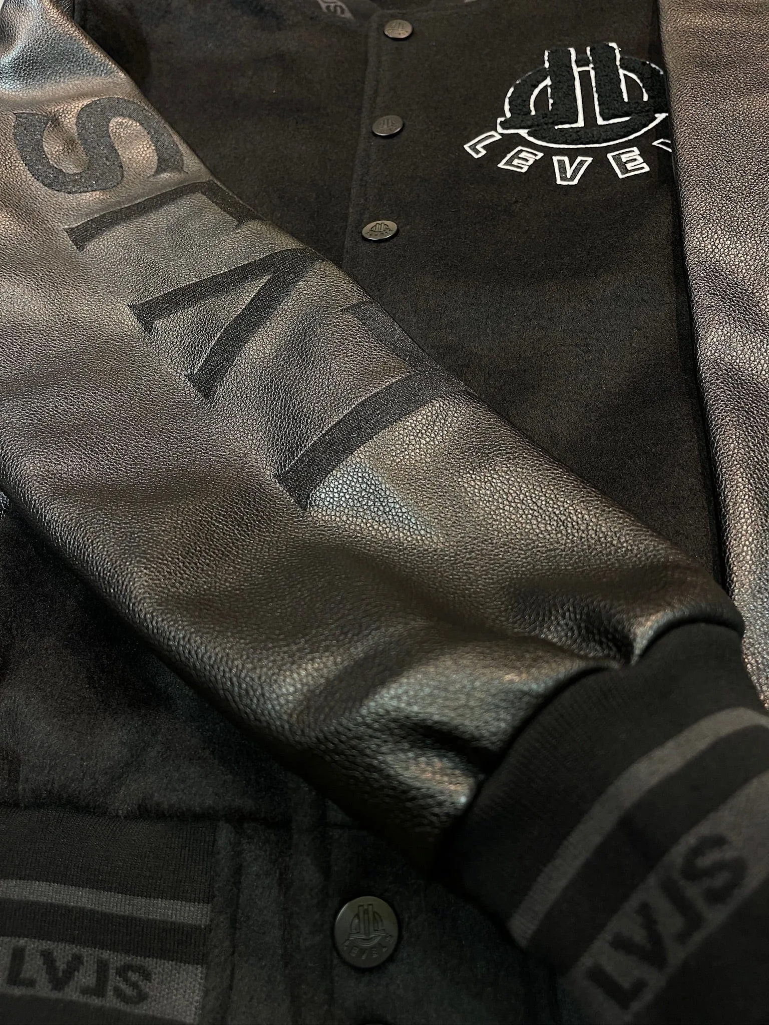 LEVELS ALUMNI VARSITY JACKET