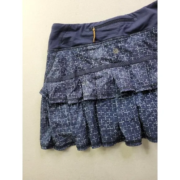 Lululemon Women's 4 Pace Setter Tennis Skirt Navy Print Lined Vented Pleated