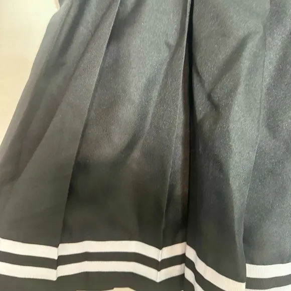 NWT. Delia’s Dolls Kill 3X skirt. black and white cheerleading style pleated